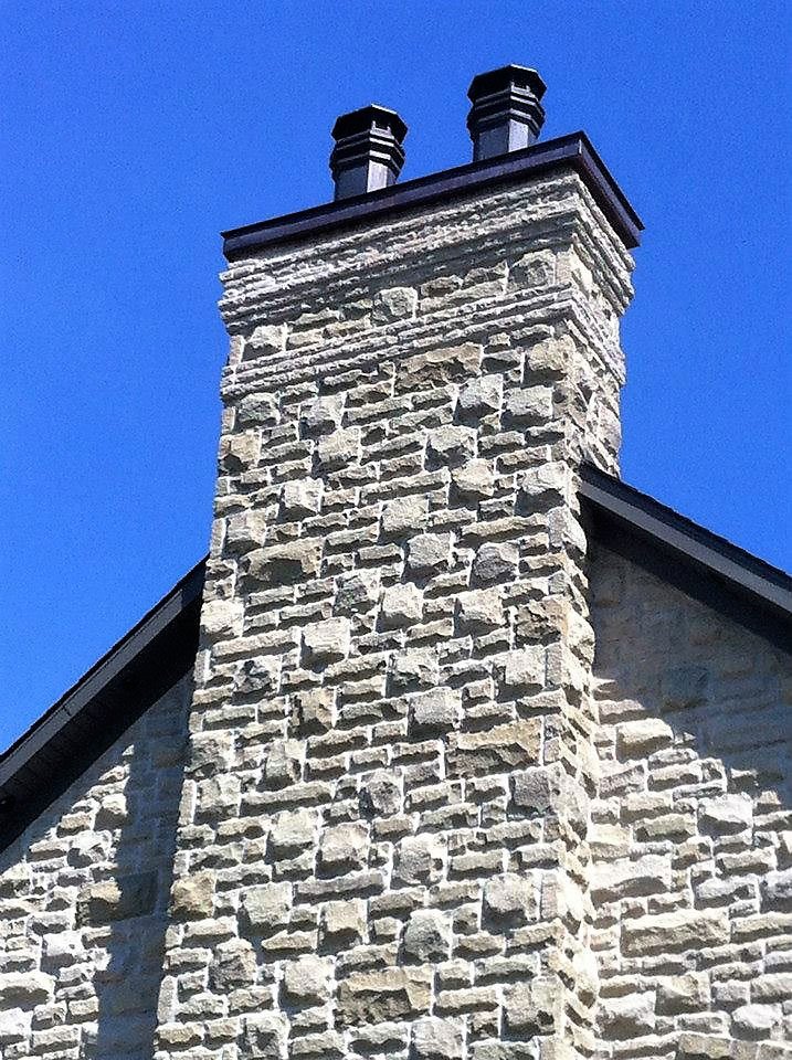 Masonry chimney repair and restoration work.