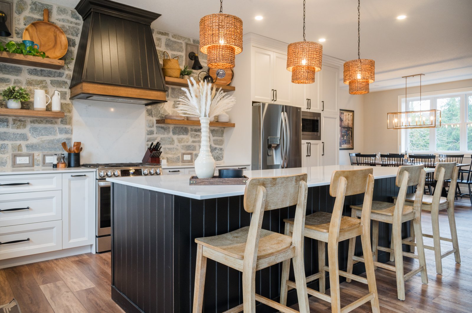 Custom kitchen renovation with new cabinets, counters, and lighting.